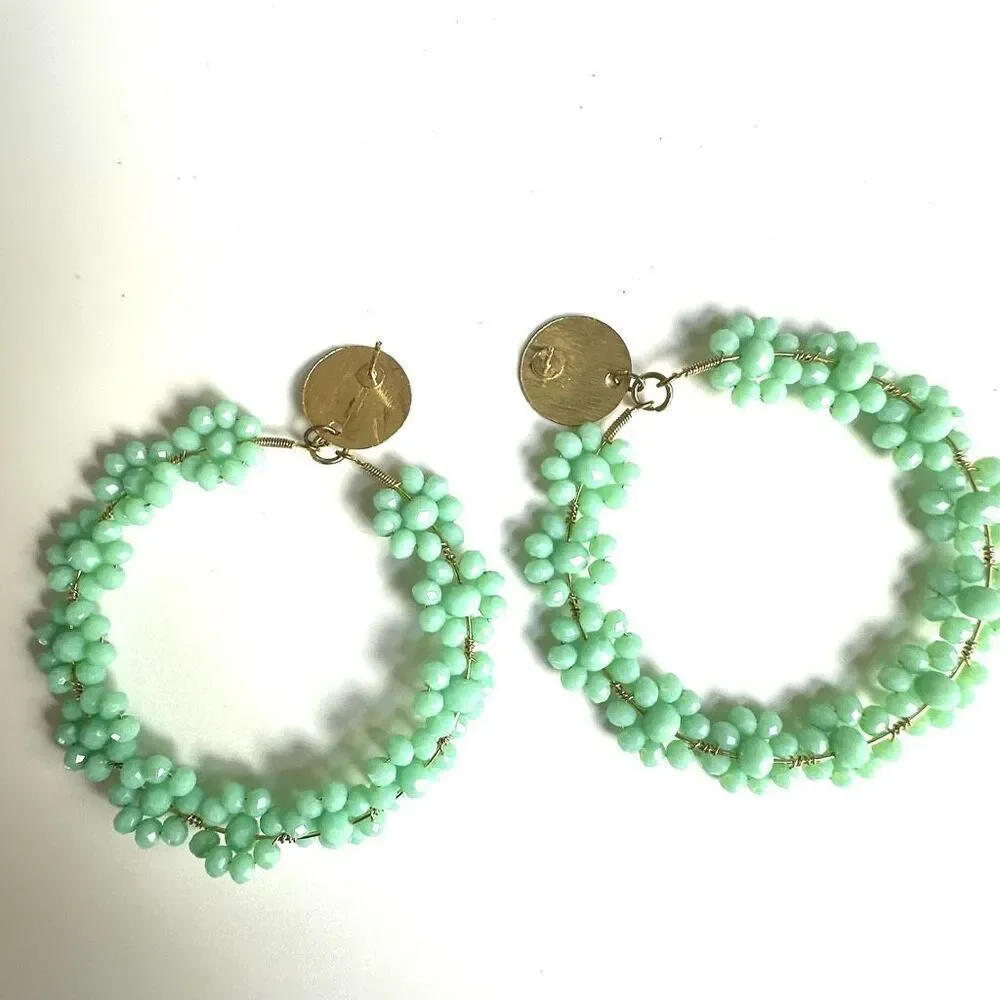 Large green floral circle statement earrings